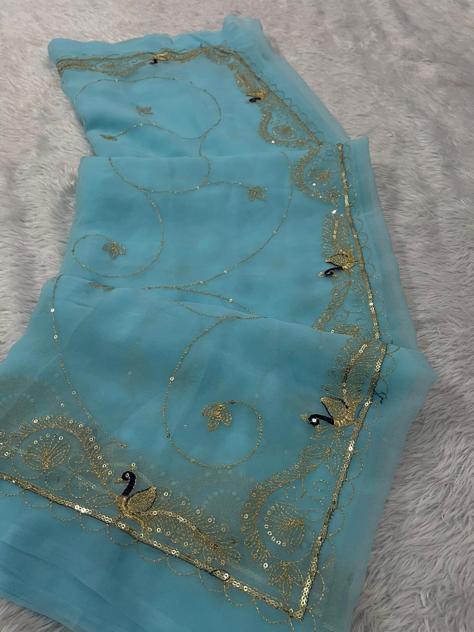 Royal Emerald Saree with Intricate Gold Thread & Peacock Border