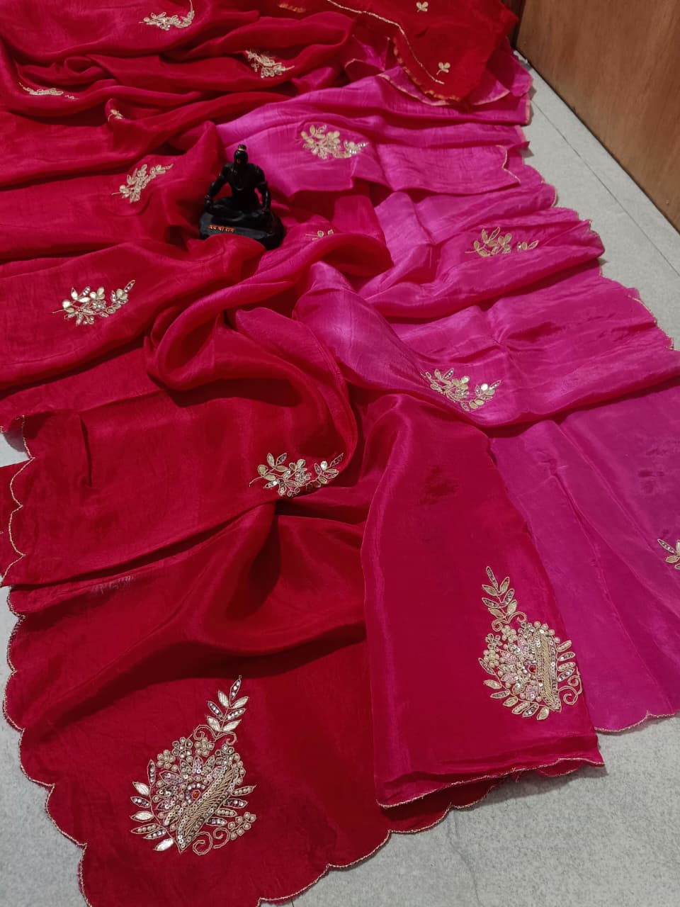 Lightweight organza paired with intricate hand embroidery