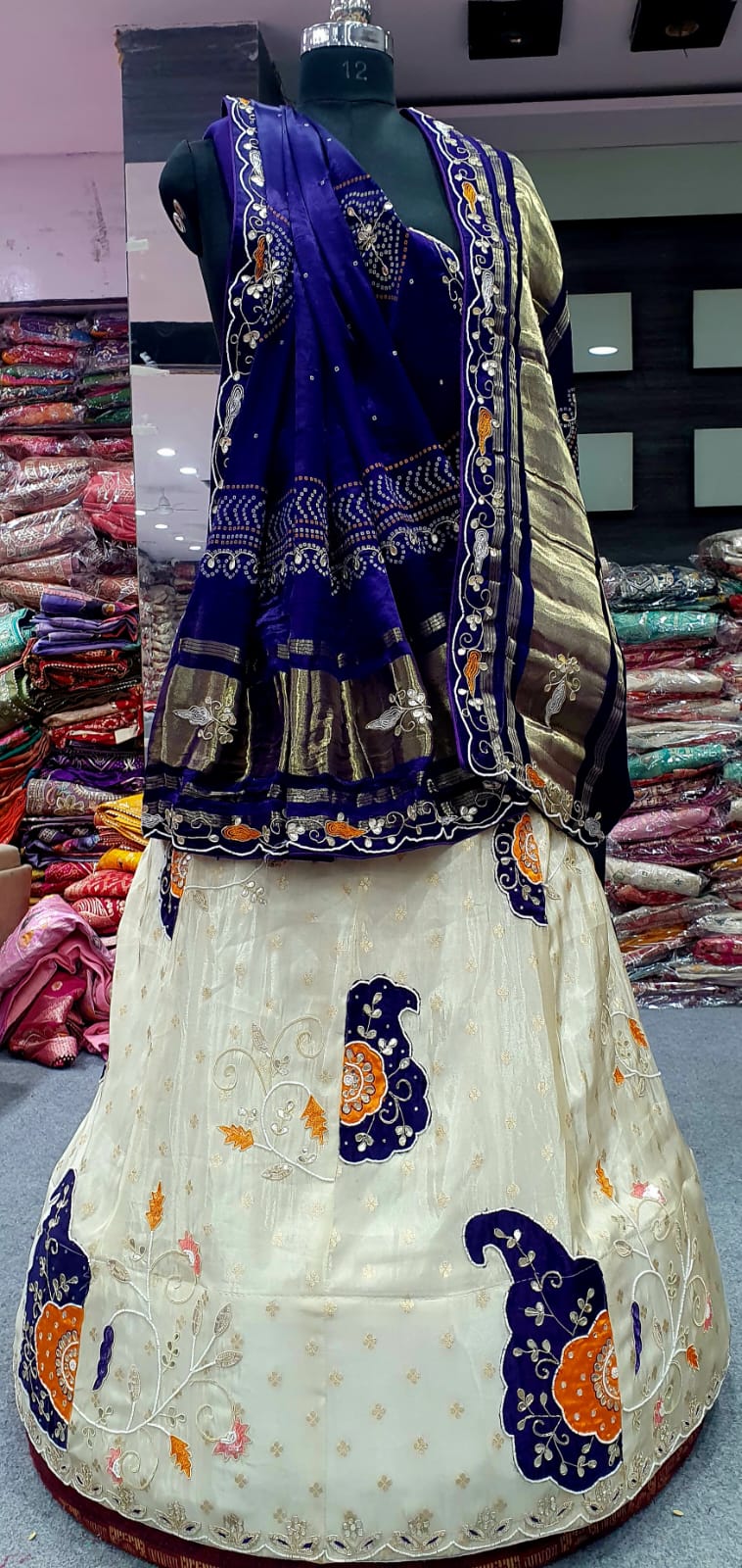 Cream Designer Lehenga with Multicolor Hand Embroidery