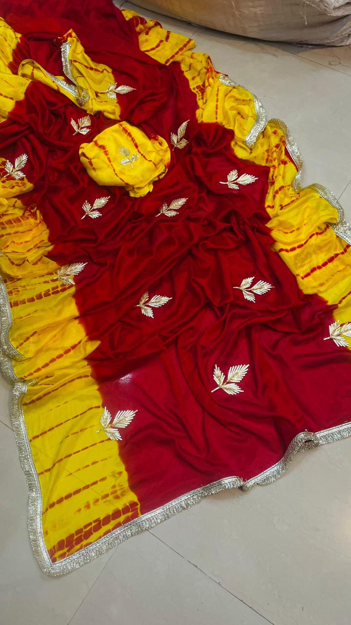 Handcrafted Red–Yellow Saree with Zari Leaf Buttis