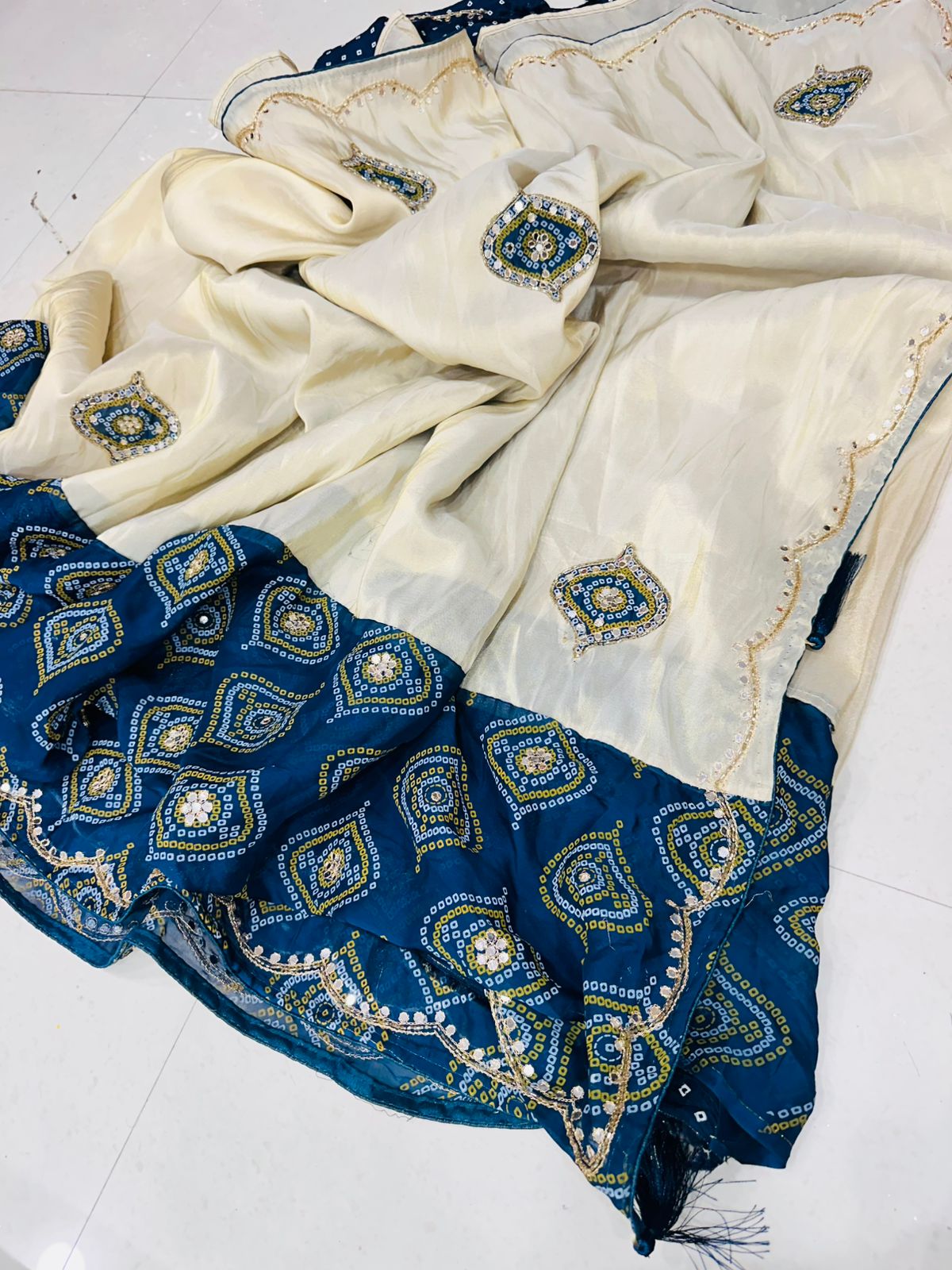 Festive Wear Cream Silk Saree with Bandhej Border