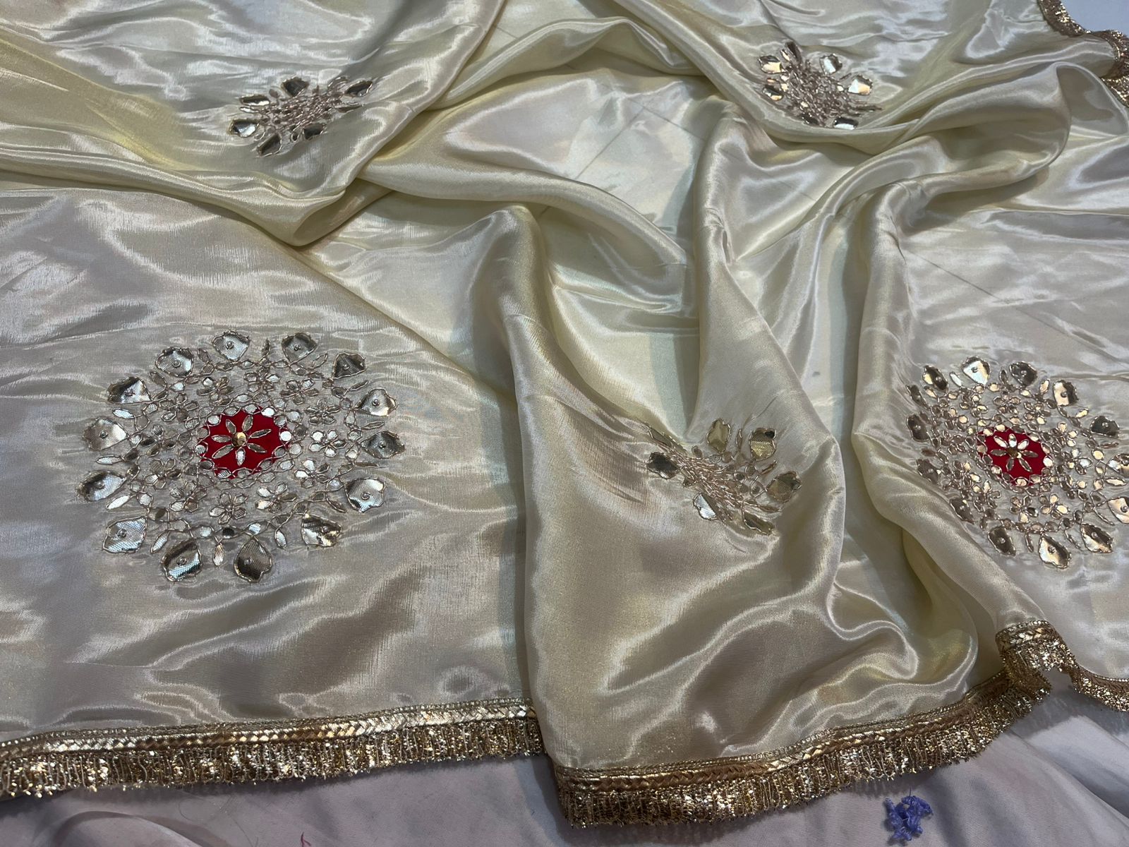 Ivory Satin Silk Saree with Mirror Work & Red Stone Floral Motifs