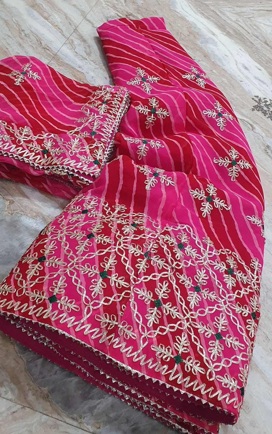 Traditional Rani Pink Leheriya Lehenga Choli with Heavy Gota Patti Border