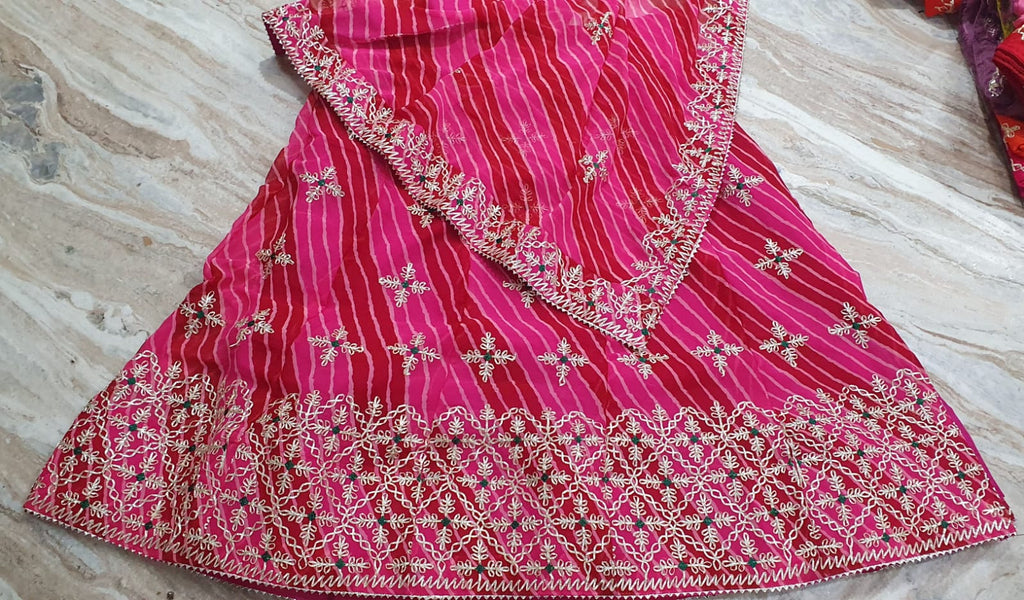 Traditional Rani Pink Leheriya Lehenga Choli with Heavy Gota Patti Border