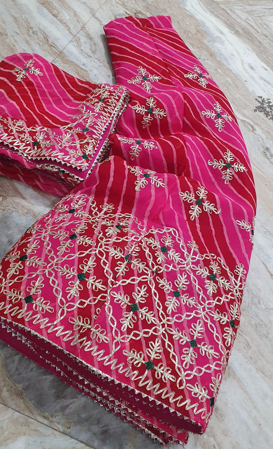Traditional Rani Pink Leheriya Lehenga Choli with Heavy Gota Patti Border
