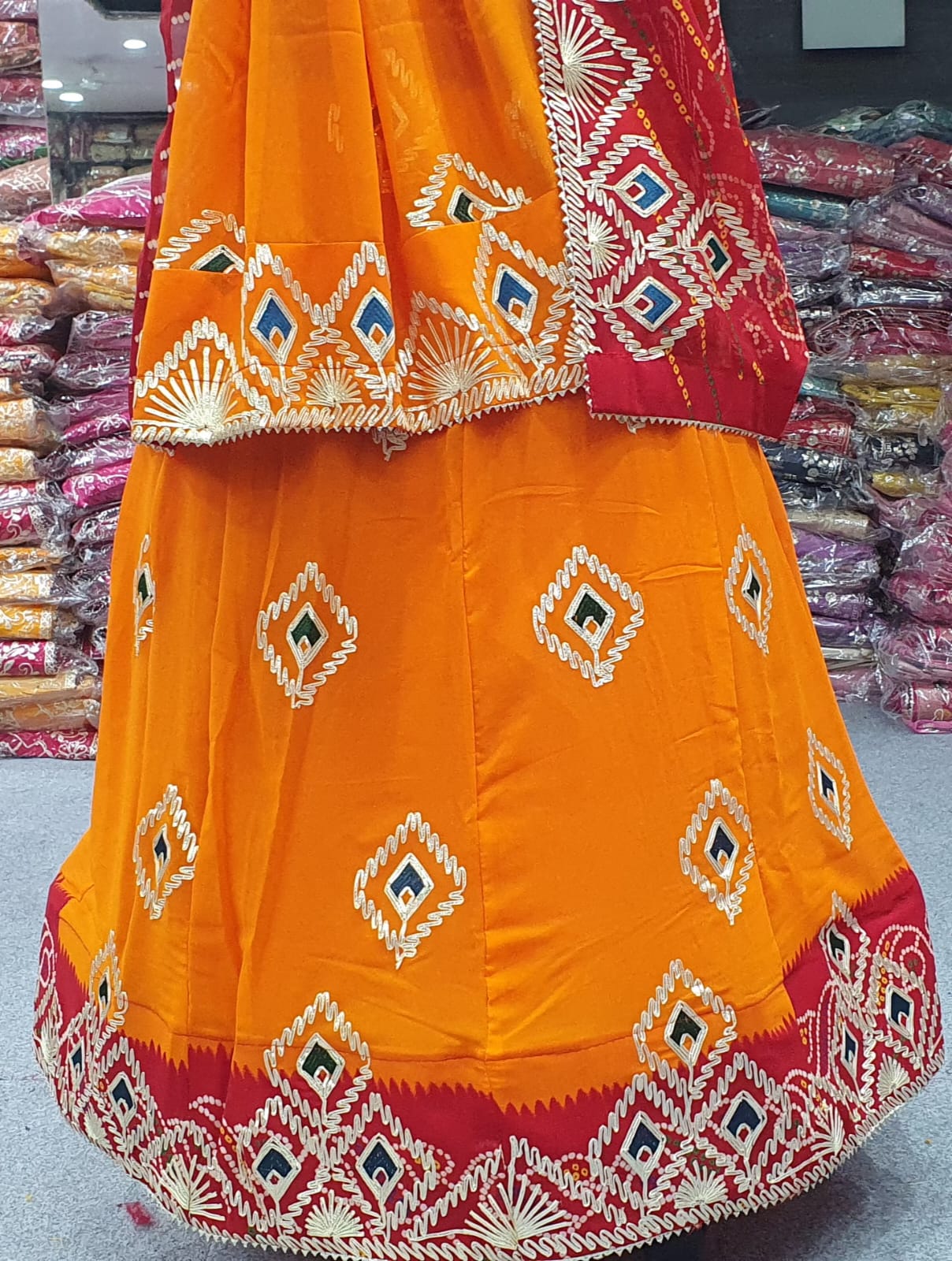 The Bandhani Classic: Radiant Orange & Red Festive Lehenga