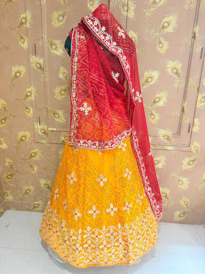 Royal Festive Wear Georgette Bandhani Lehenga by pcd yellow red